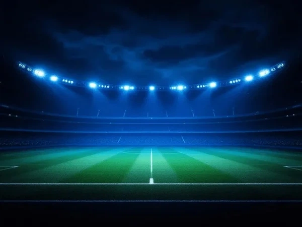 夜间足球场灯光照射下的比赛场景展示欧赔投注环境